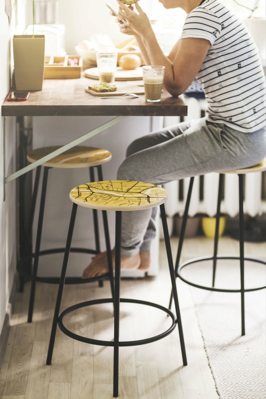 Wooden stool with metal legs. Photo: Hanna Maran